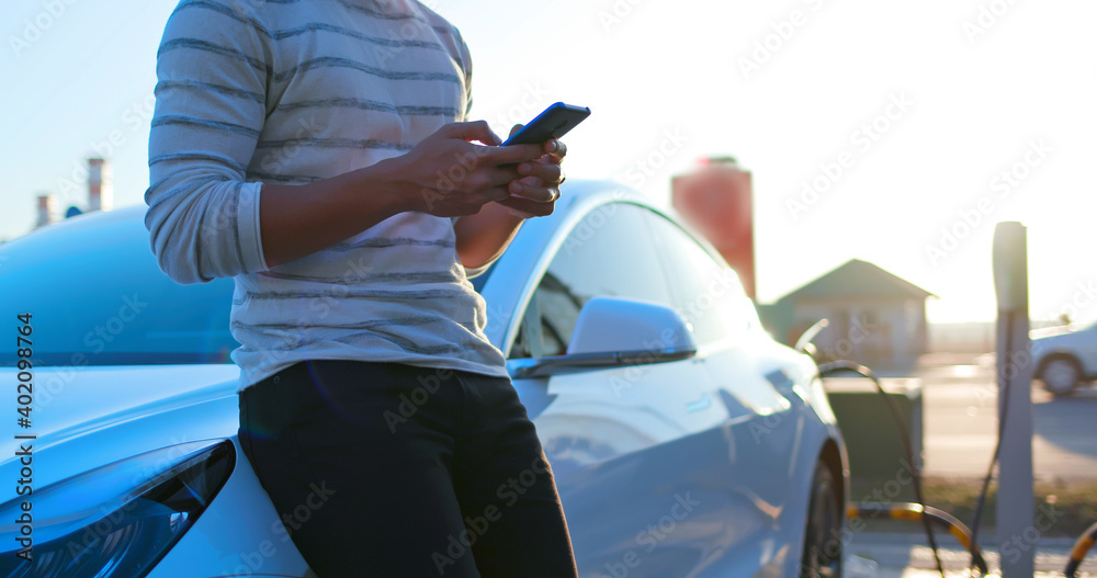 man Charges electric car