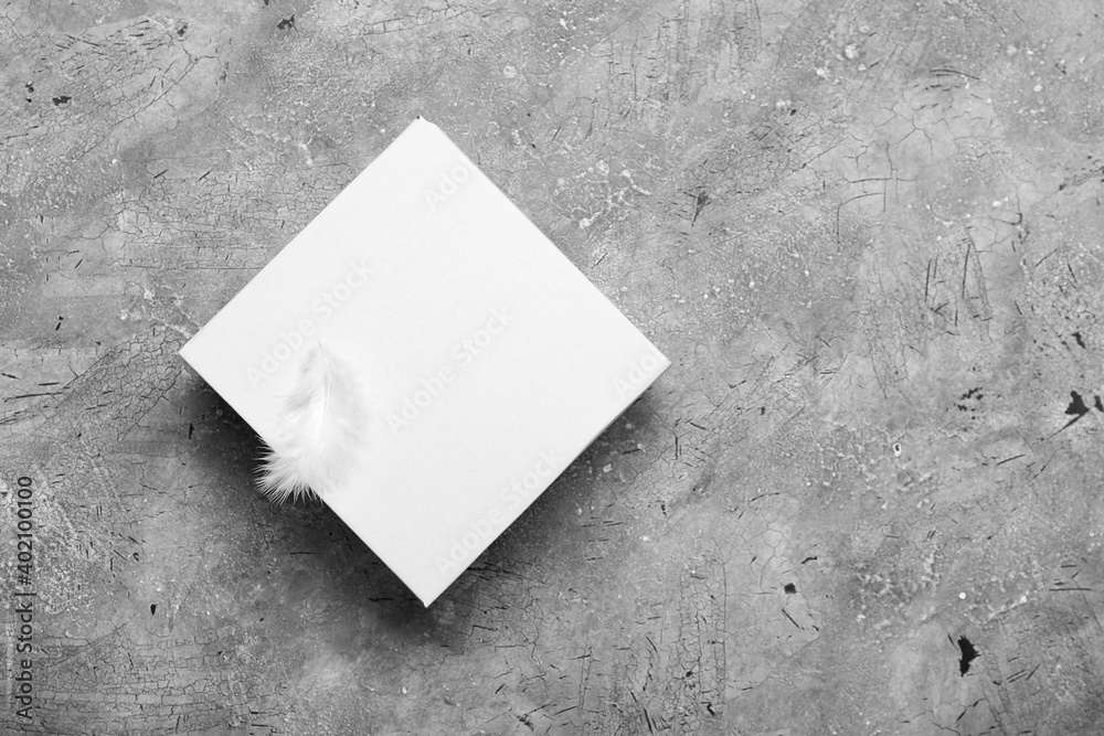 Blank cardboard box on gray background