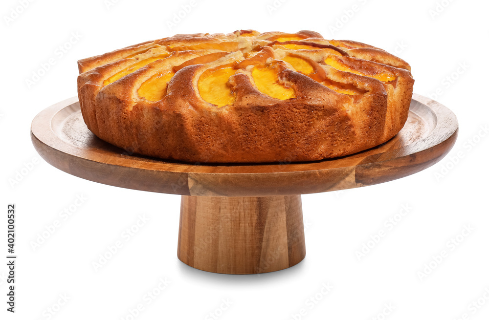 Dessert stand with tasty peach pie on white background