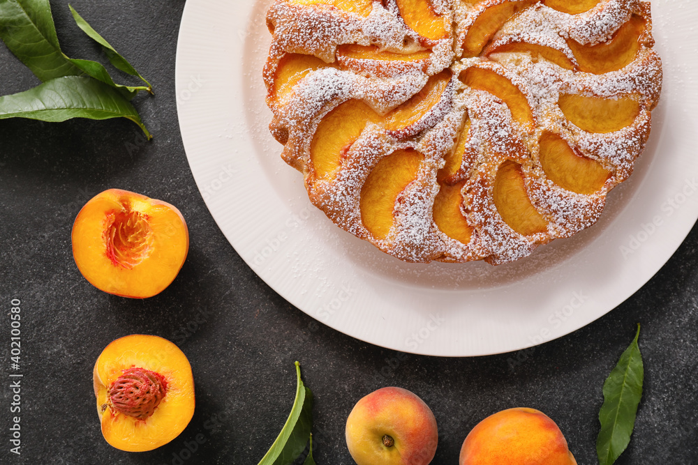 Plate with tasty peach pie, closeup