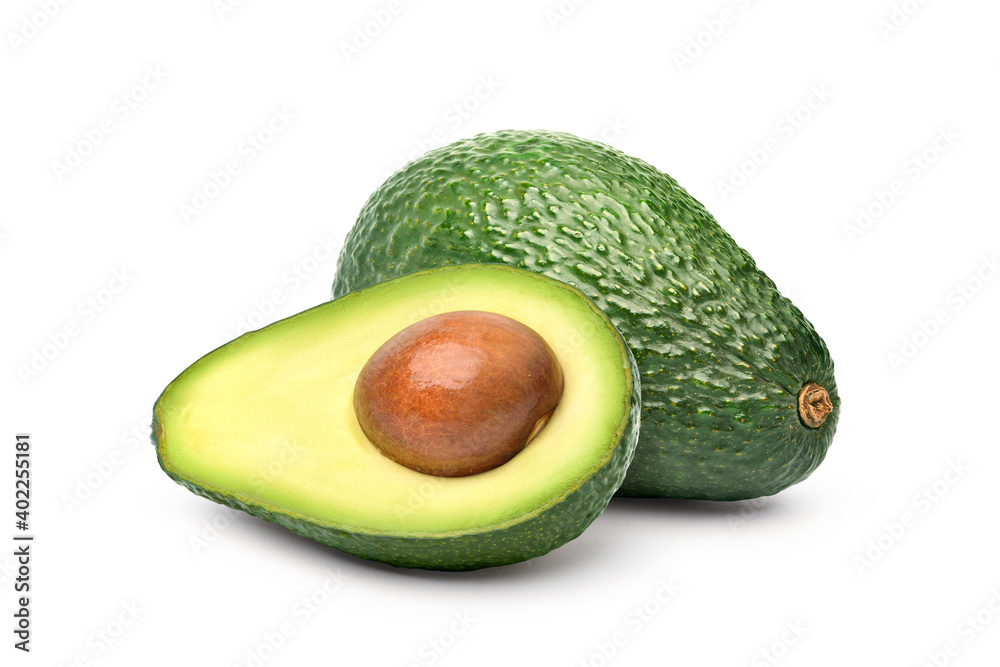 Avocado with cut in half isolated on white background. Clipping path.