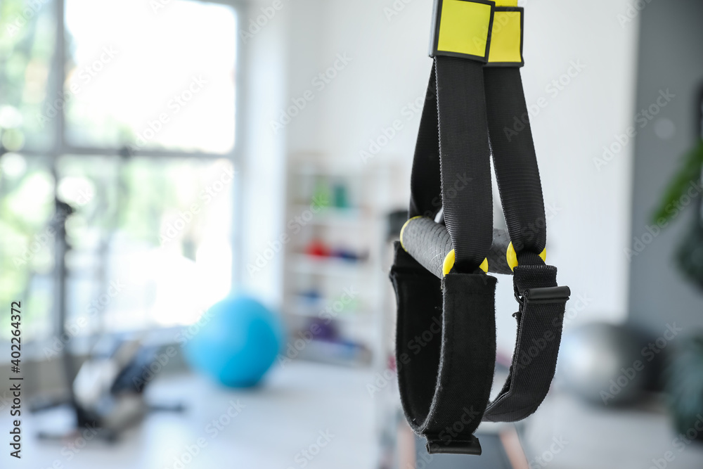 TRX straps in modern gym