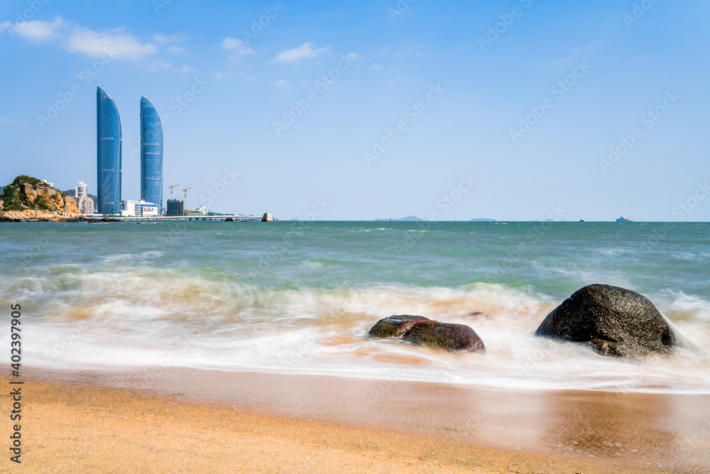 Seaside scenery of Shimao twin towers in Xiamen, Fujian, China