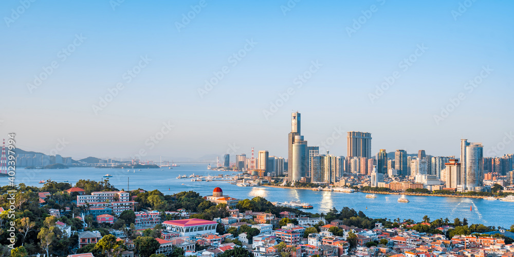 Sunny scenery of twin towers and Gulangyu in Xiamen, Fujian, China