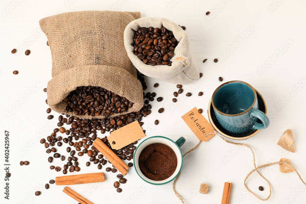 Composition with coffee bags on white background