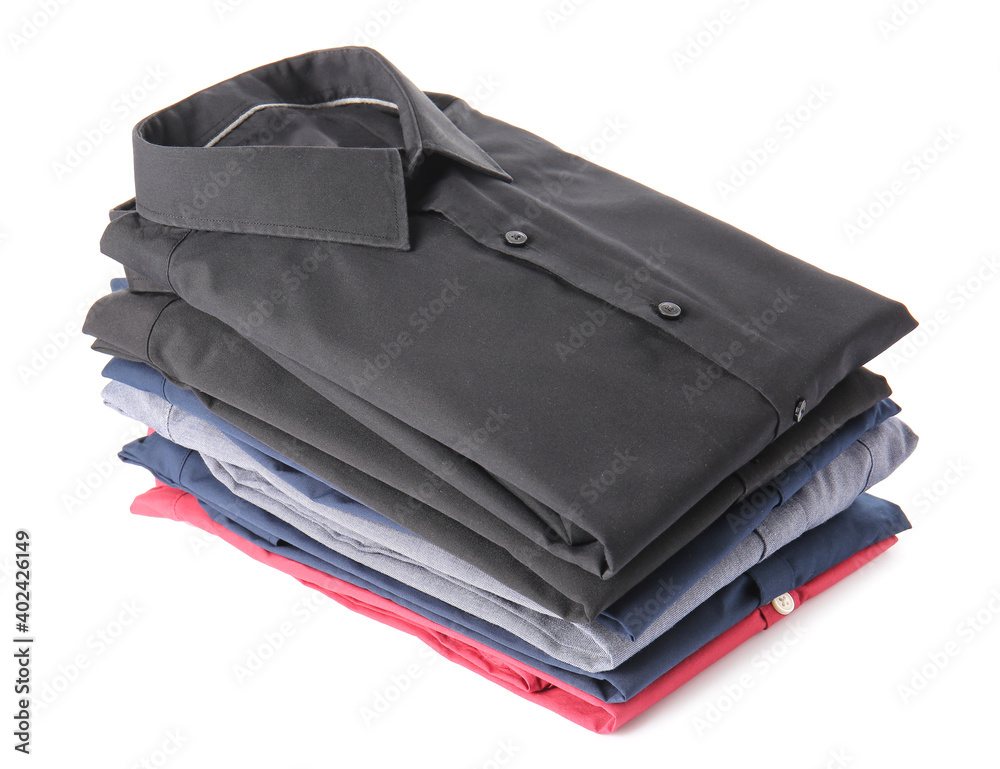 Stack of folded male shirts on white background