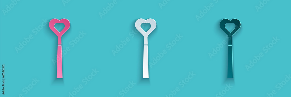 Paper cut Magic wand icon isolated on blue background. Star shape magic accessory. Magical power. Pa