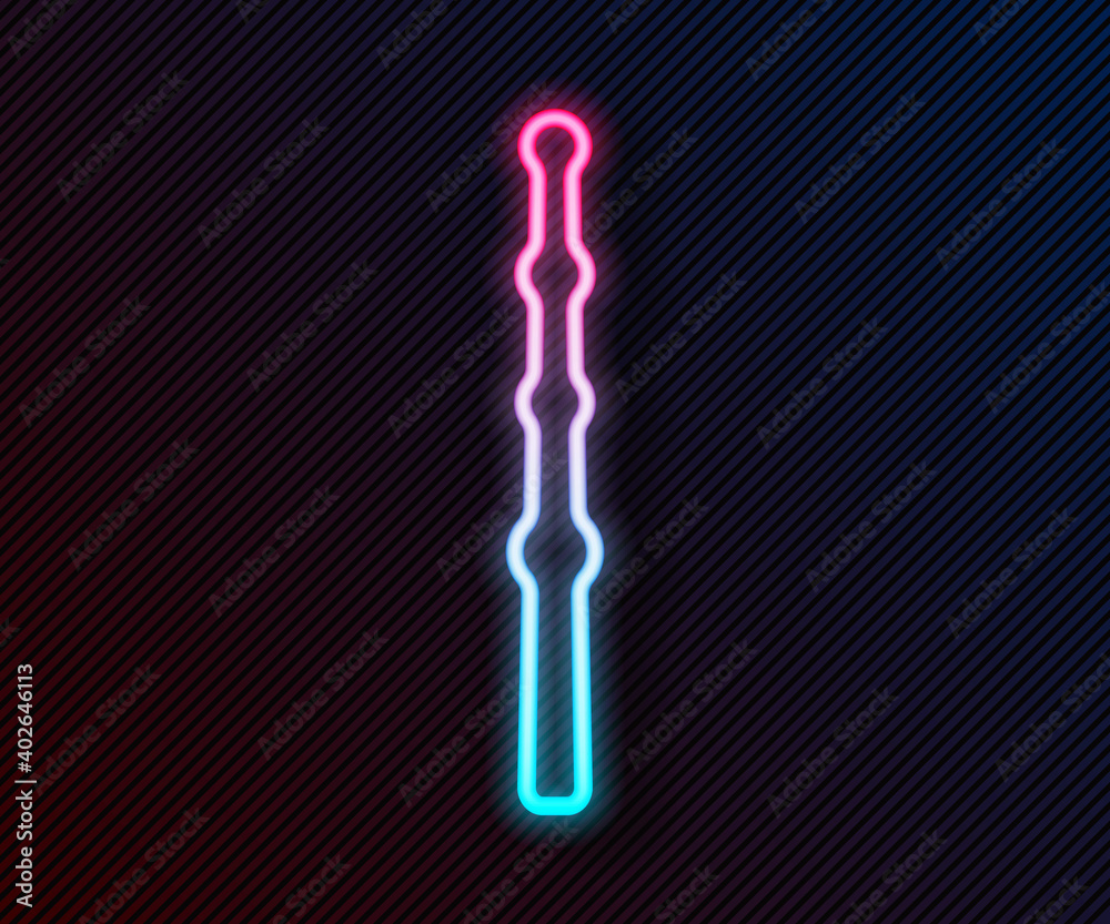 Glowing neon line Magic wand icon isolated on black background. Star shape magic accessory. Magical 