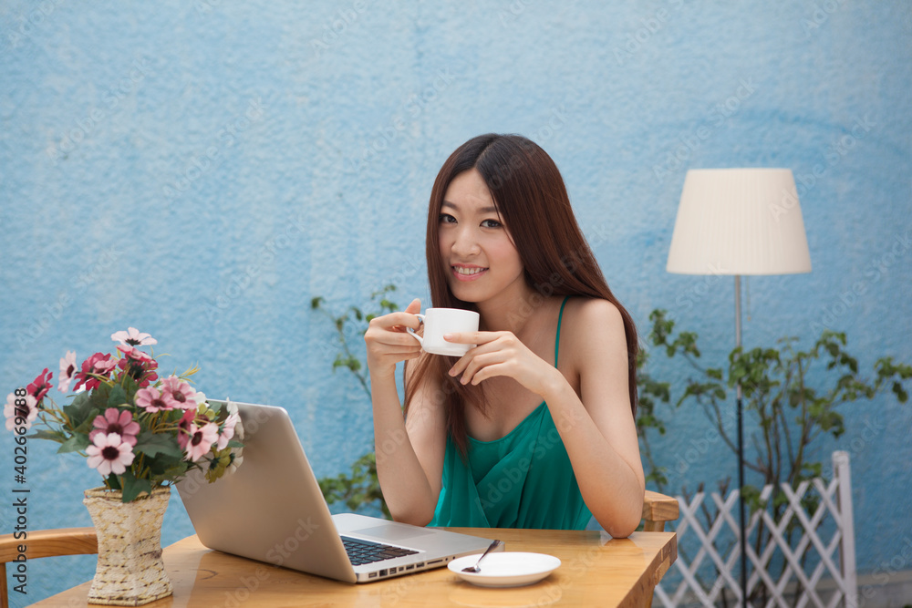 A women working in front of computers