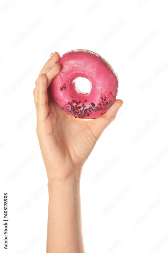 Hand with sweet donut on white background