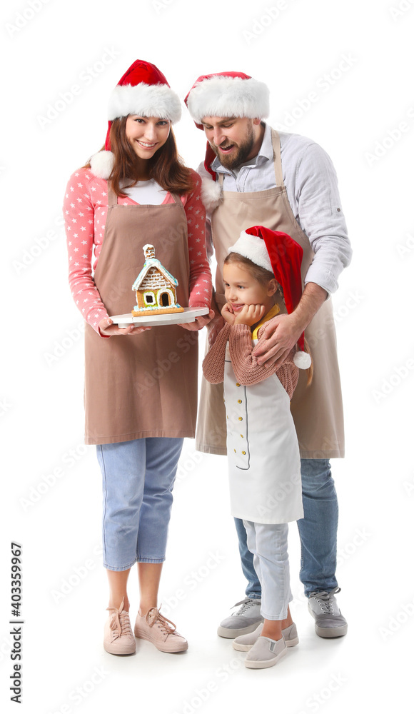 Happy family with gingerbread house on white background. Christmas celebration