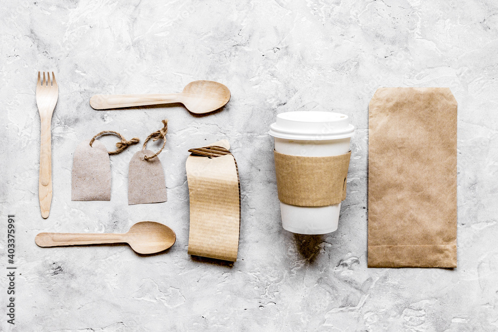 food delivery workdesk with paper bags and plastic cup table background top view mock-up