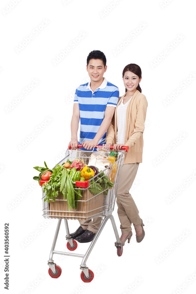 A happy young couple are Grocery shopping 