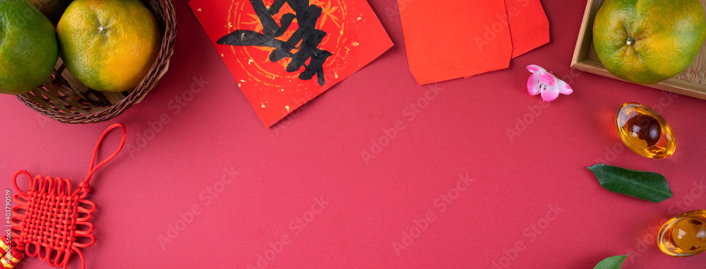 Top view of fresh orange on red background for Chinese lunar new year.