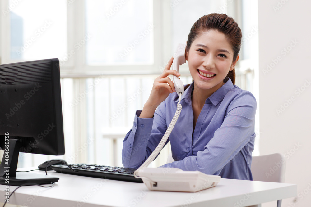 A young Business woman using a smartphone