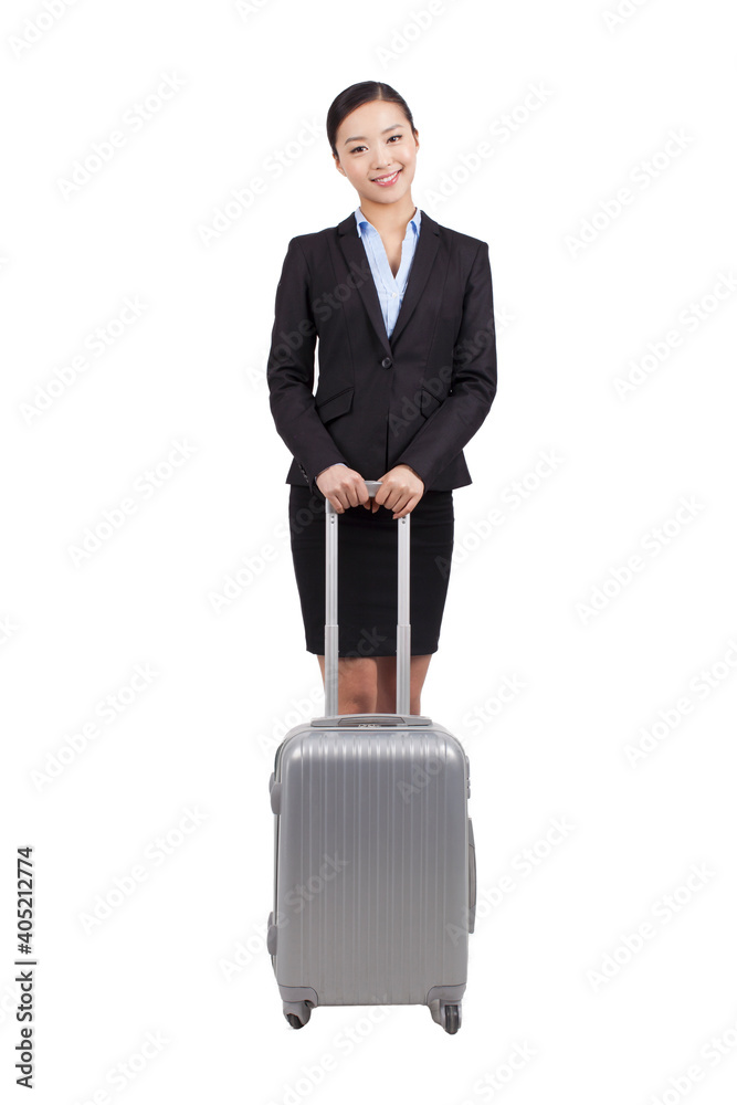 A young Business woman walking with suitcase 