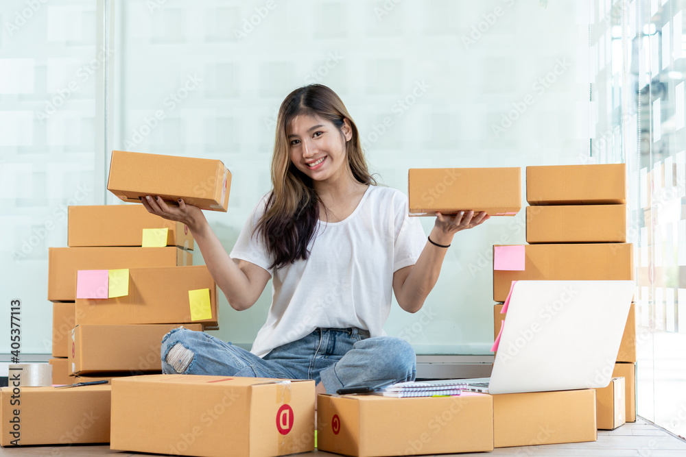 Successful Woman Entrepreneur With Parcel Boxes In Her Own Job Shopping Online Business At Home