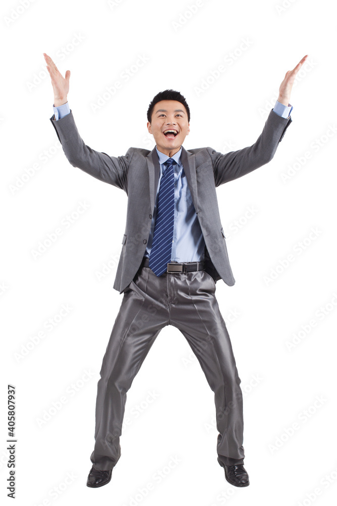 Portrait of young businessman yelling,standing in white background 