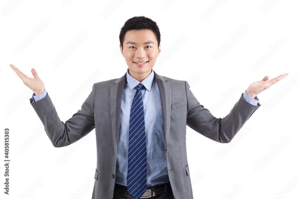 Portrait of young businessman standing in white background 