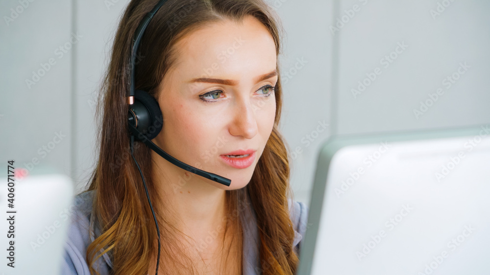 Business people wearing headset working in office to support remote customer or colleague. Call cent