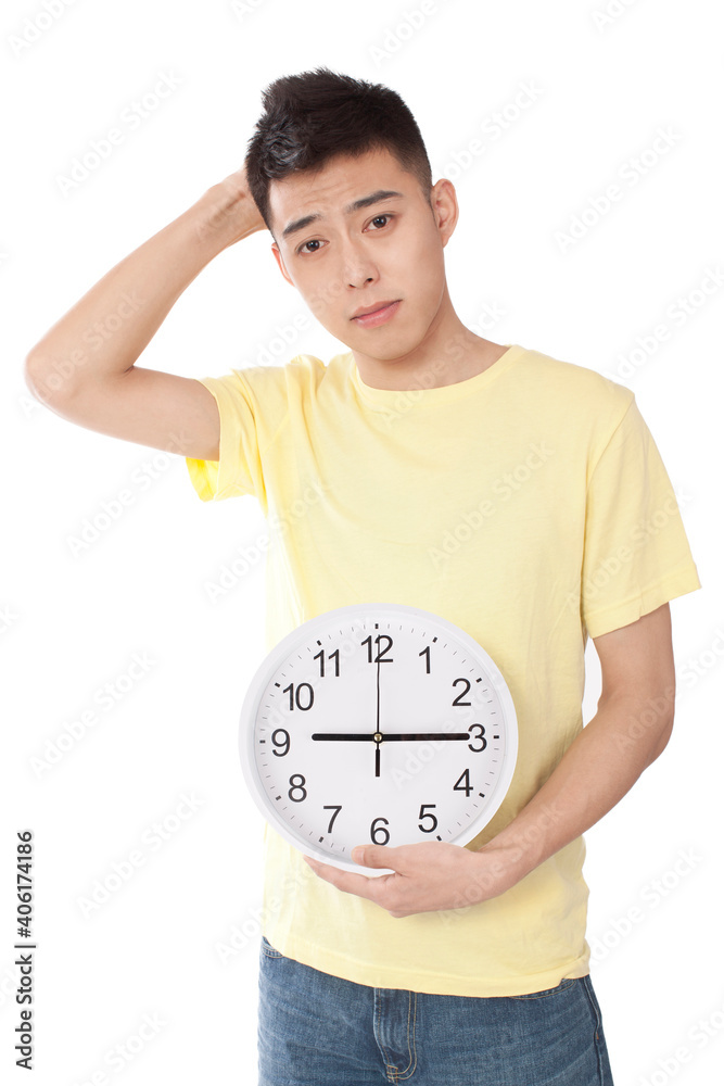 Portrait of a young man holding plate