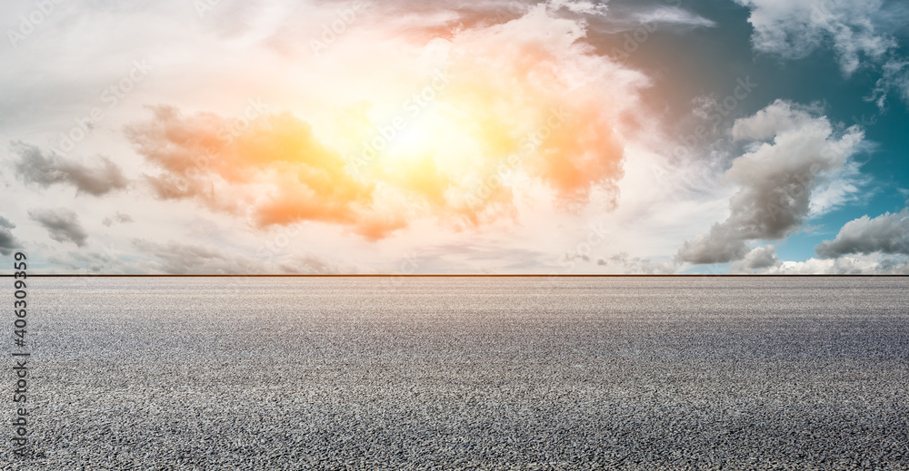 Asphalt road and sky clouds at sunset.Road background.