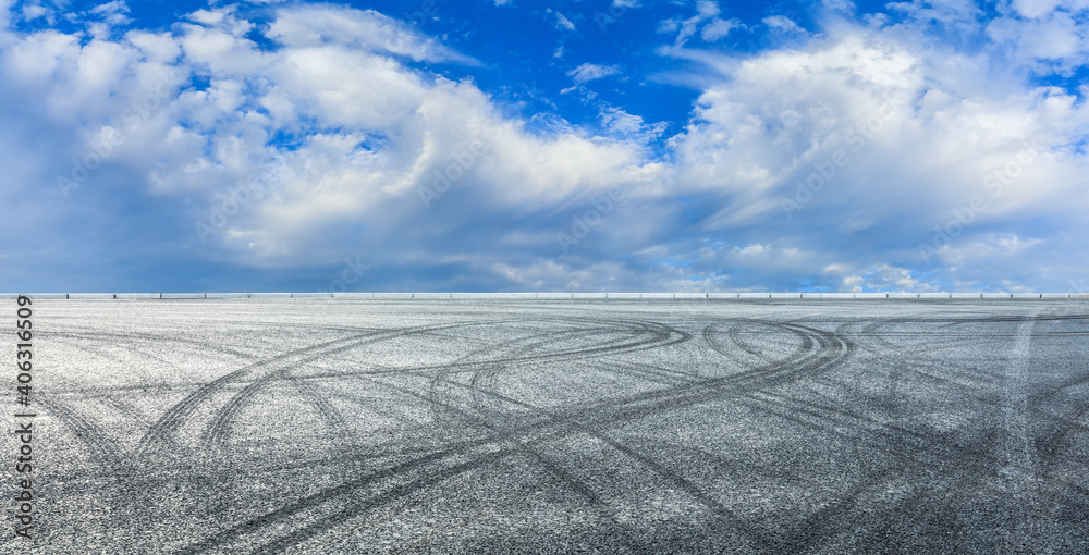 Asphalt race track road and sky clouds.Road ground background.