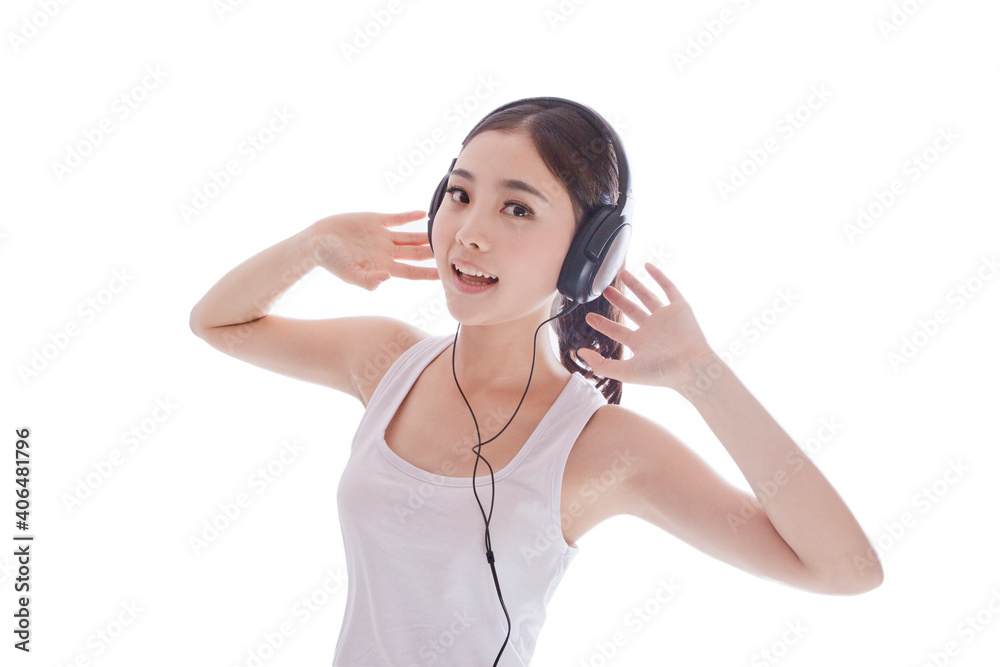 Portrait of a Young woman listening to music