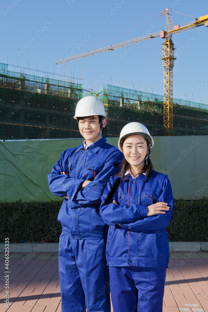 The Young Engineers working at construction field 