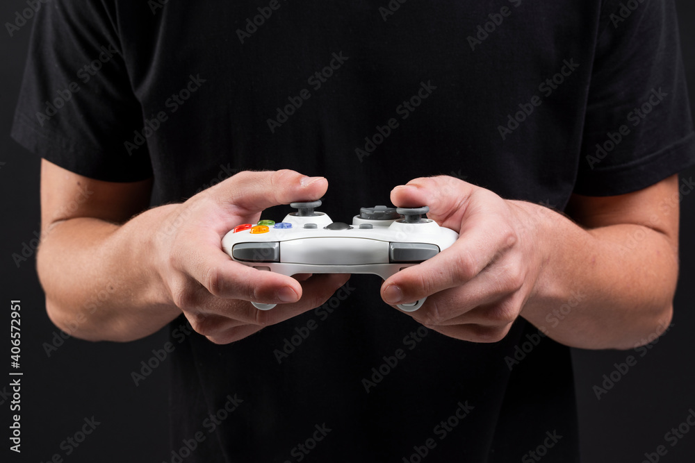 Hand playing video game using a game console entertainment technology