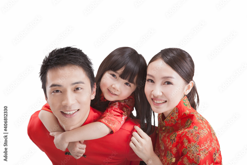 Portrait of daughter with parents in Tang suits,close-up