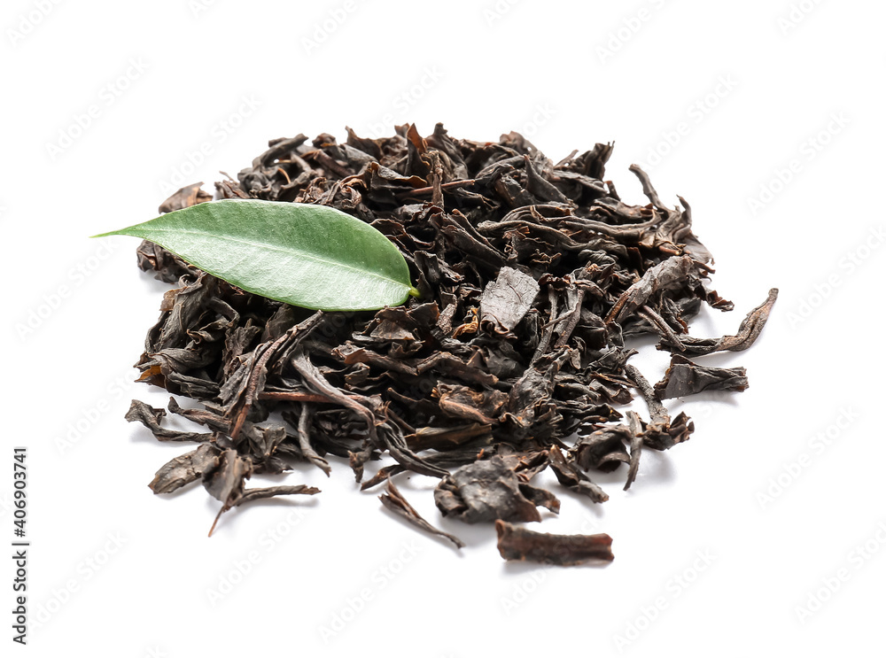 Heap of dry black tea leaves on white background