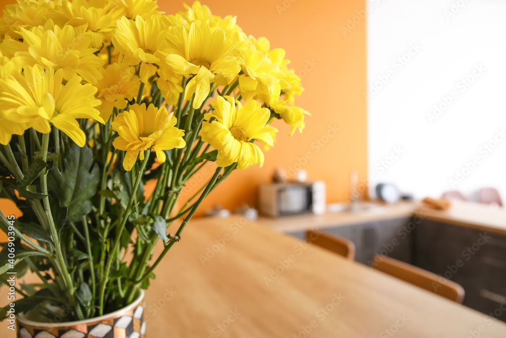 Beautiful flowers in modern kitchen