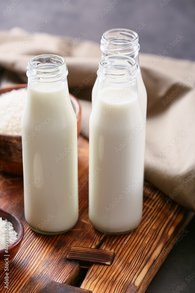 Bottles of rice milk on table