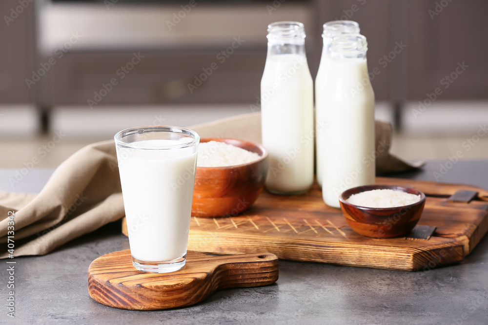 Glass of rice milk on table