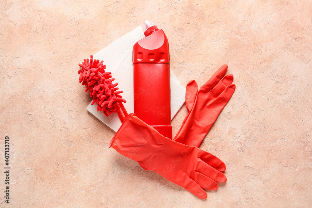 Set of cleaning supplies on color background