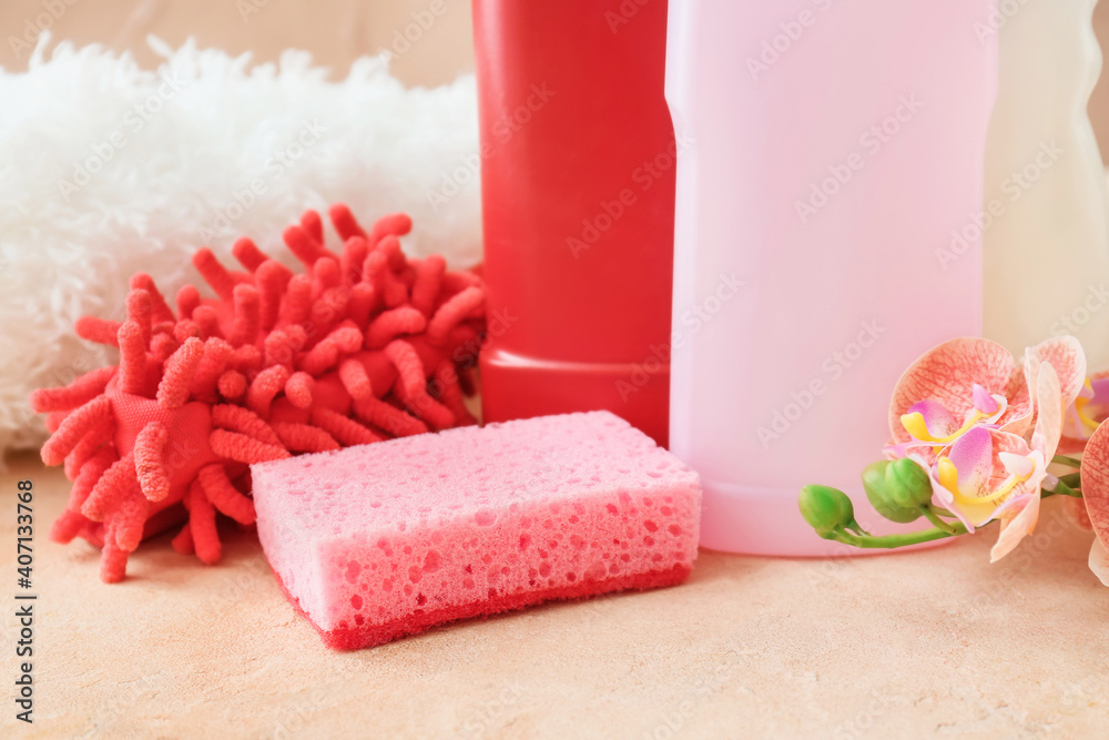 Set of cleaning supplies on table