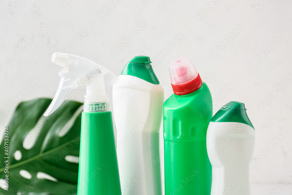 Set of cleaning supplies on light background