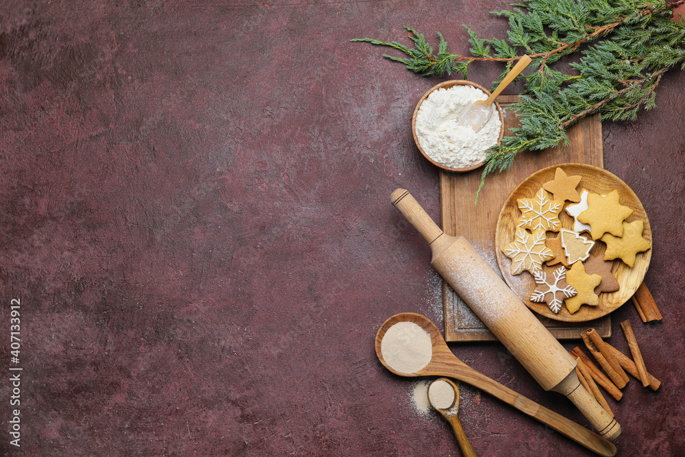 Ingredients, cookies and rolling pin on color background