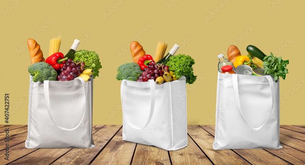 Shopping fabric bag with groceries on desk