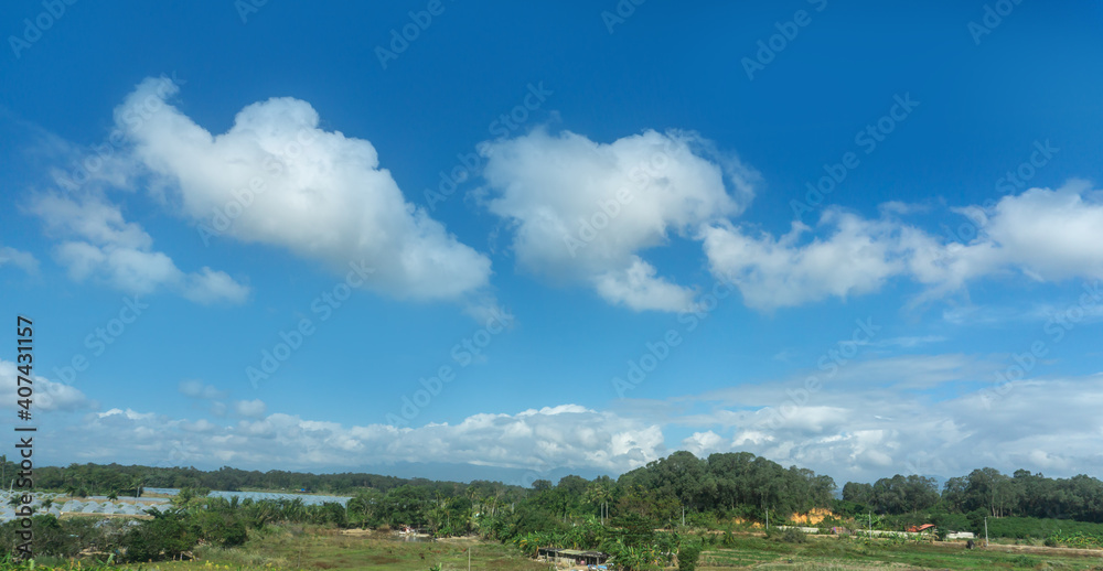 Outdoor blue sky white clouds and rural scenery