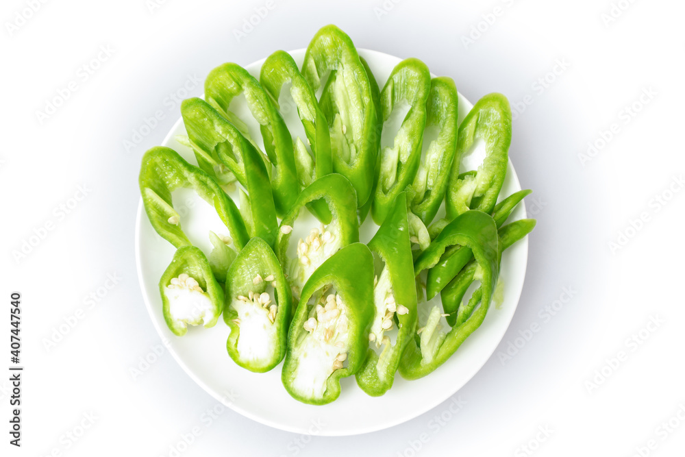 Green pepper (capsicum) on white background