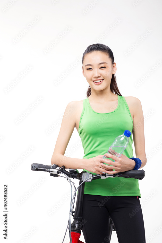 Young woman riding a bicycle