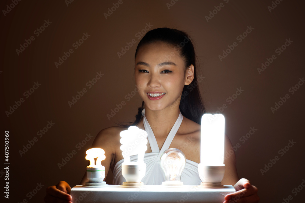 Young woman and a light bulb