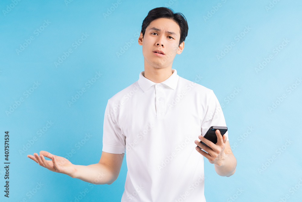 Man frowns look at camera holding smart phone having problems with wi-fi no wireless connection, nee