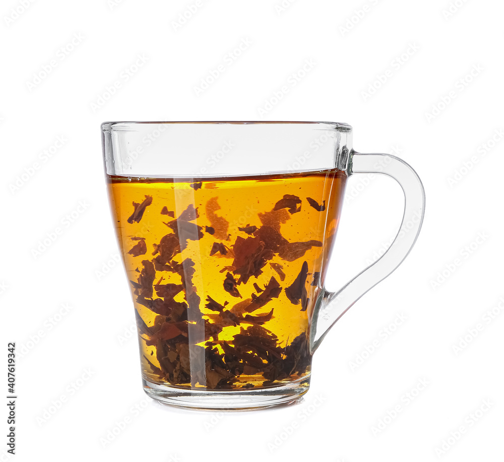 Glass cup of hot black tea on white background