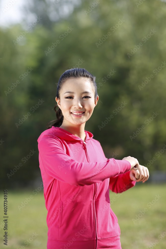 Young woman doing exercise in the outdoors