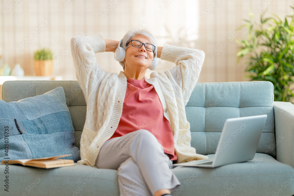 Senior woman listening to music