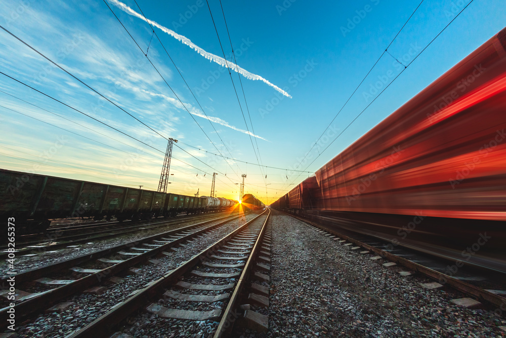 High-speed train moves by rail, delivery of goods by freight train. Train carriages at the station