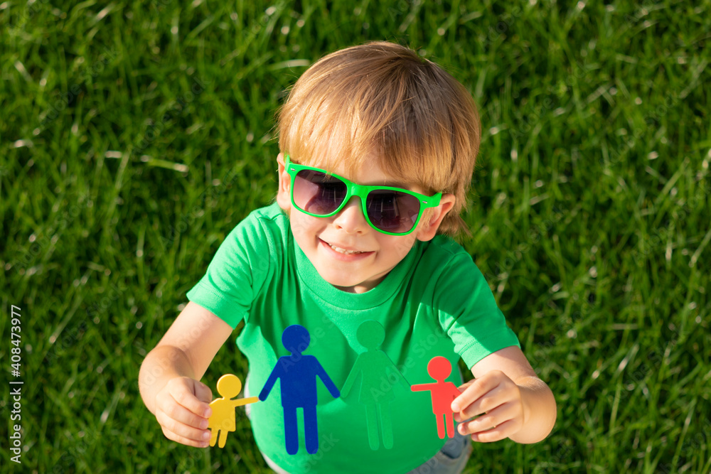 Toy family in children`s hands